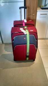 giant red suitcases